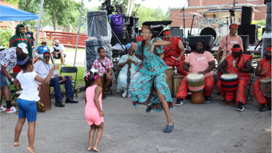 community gathering and dancing